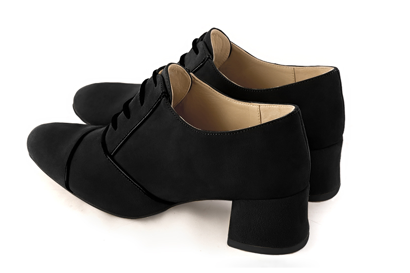 French elegance and refinement for these matt black essential lace-up shoes, 
                available in many subtle leather and colour combinations. This pretty flat lace-up model will enhance your most basic outfits.
To be personalised or not with your own colours and materials.  
                Matching clutches for parties, ceremonies and weddings.   
                You can customize these lace-up shoes to perfectly match your tastes or needs, and have a unique model.  
                Choice of leathers, colours, knots and heels. 
                Wide range of materials and shades carefully chosen.  
                Rich collection of flat, low, mid and high heels.  
                Small and large shoe sizes - Florence KOOIJMAN